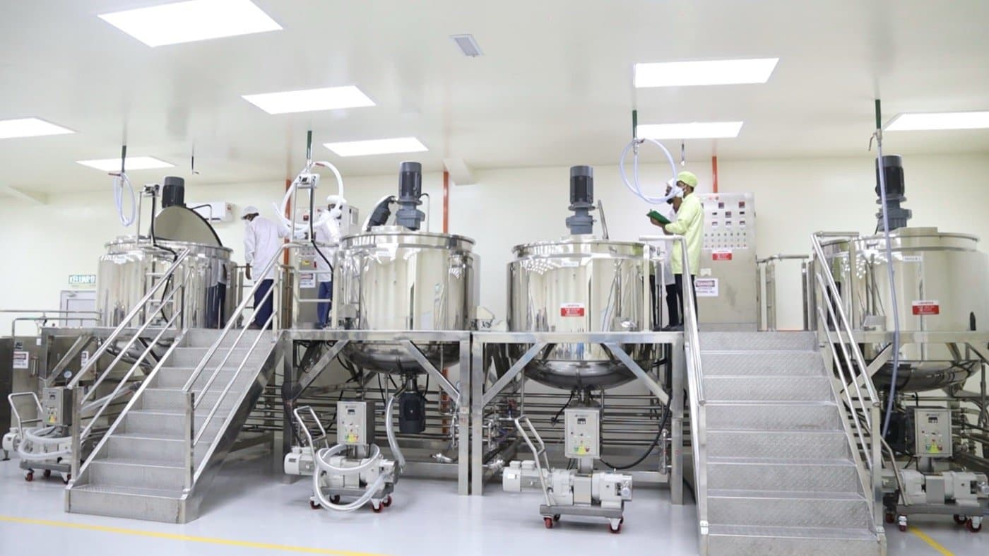 Mixing vessels and production team at HE Manufacturing in Malaysia